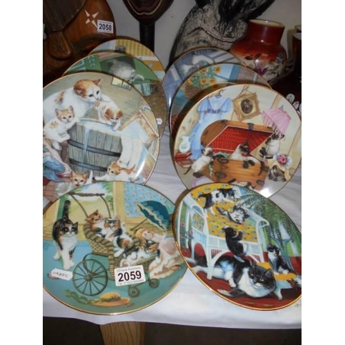 2059 - Eight cat collector's plates.