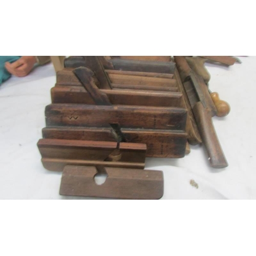 2079 - A quantity of old woodworking planes.