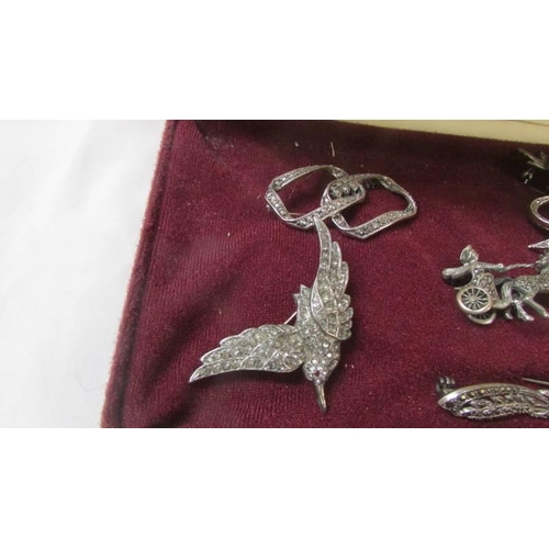 2099 - Seven silver marcasite brooches.