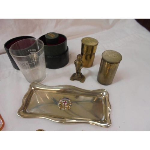 2140 - A mixed lot including boxed measuring cup, Madame Tassaud's ashtray etc.