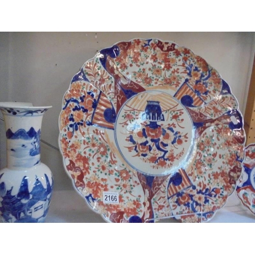 2166 - A large Chinese charger a/f. a Chinese plate a/f and a Chinese vase a/f.