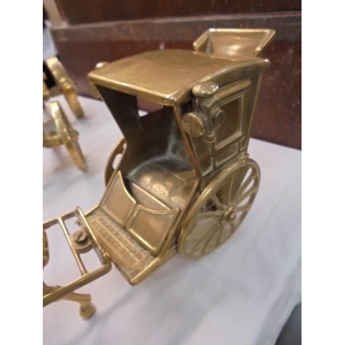 2181 - A solid brass model of a hansom cab with horse.