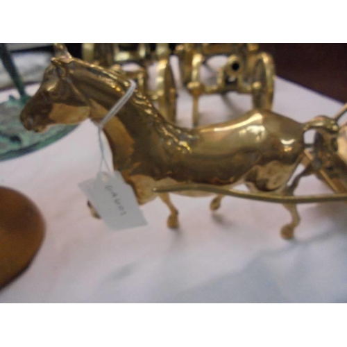 2181 - A solid brass model of a hansom cab with horse.