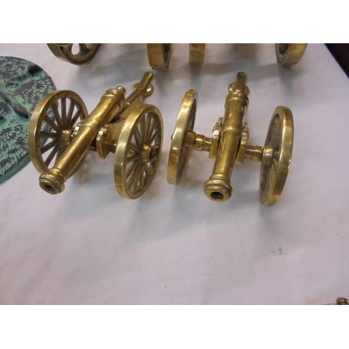 2182 - Two pairs of solid brass cannons.