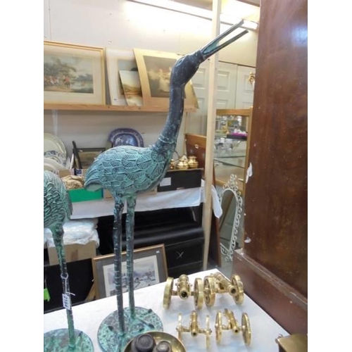 2184 - A pair of metal garden storks. COLLECT ONLY.