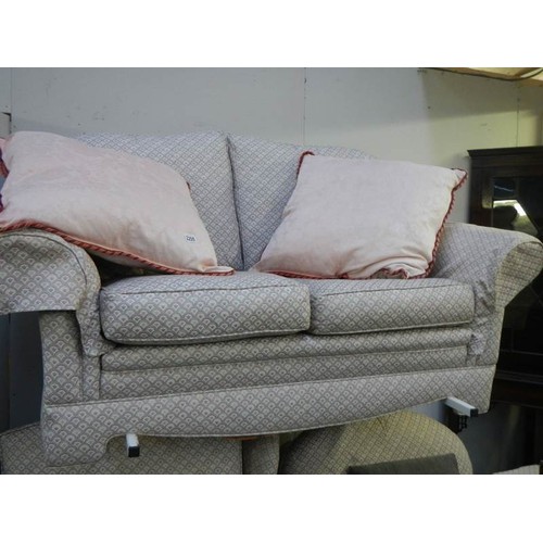 2255 - A good quality three piece suite with footstool, COLLECT ONLY.