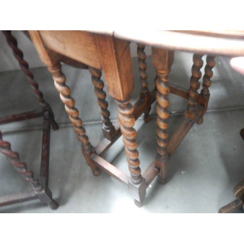 2308 - A good clean oak barley twist leg table. COLLECT ONLY.