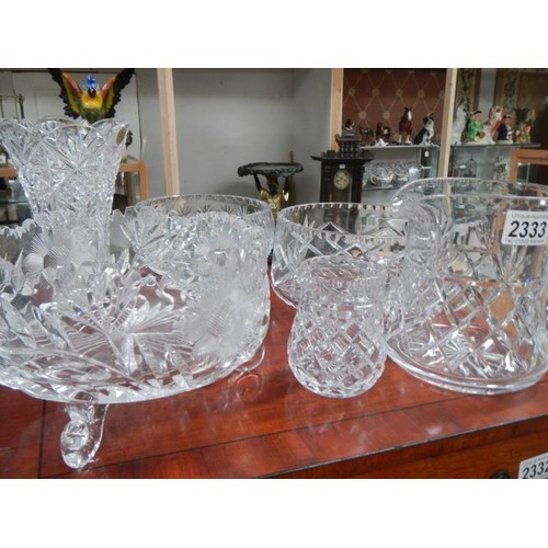 2333 - A good lot of cut glass items.