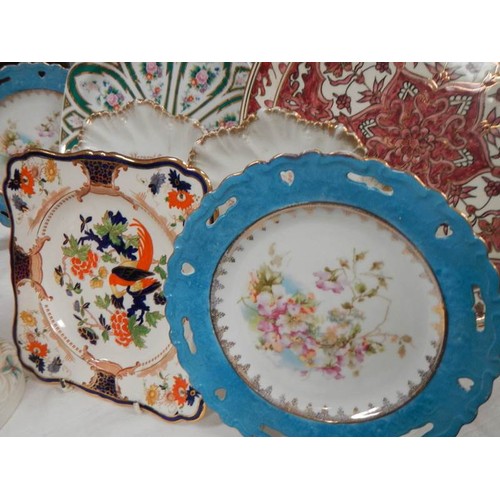 2335 - A mixed lot of assorted plates including late Victorian.