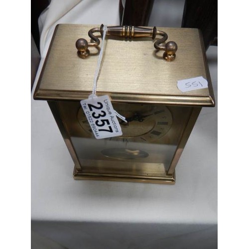 2357 - A brass mantel clock in working order.