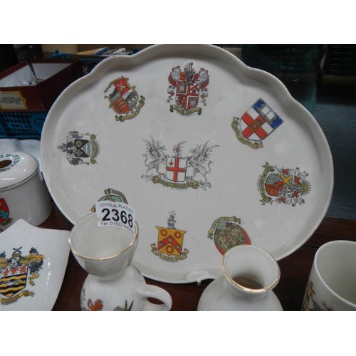 2368 - Eleven pieces of Goss crested china.