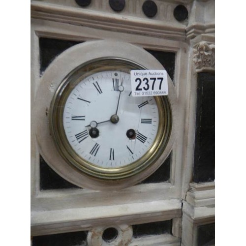 2377 - A Victorian French white marble style mantel clock.