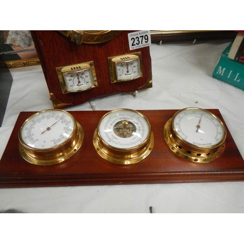 2379 - Three late 20th century clocks etc.,