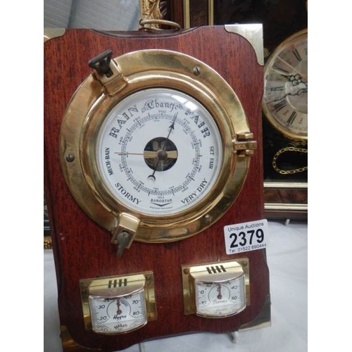 2379 - Three late 20th century clocks etc.,