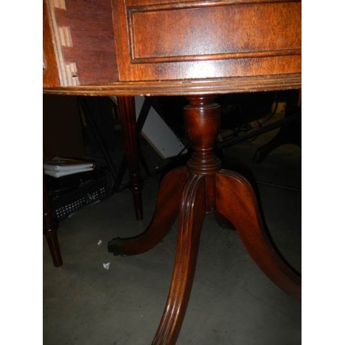 2380 - A small mahogany three drawer drum table. COLLECT ONLY.