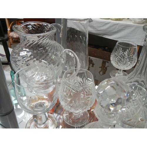 2390 - A good lot of cut glass including decanters. COLLECT ONLY.