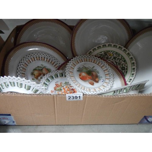 2391 - A good lot of ribbon plates etc.,