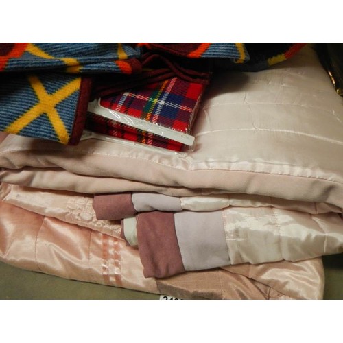 2403 - A quantity of quilts and blankets.