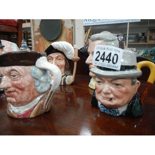 2440 - Seven character jugs including Doulton.