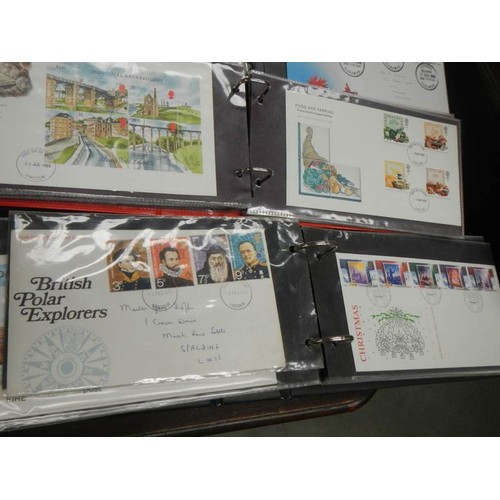 2443 - Eight albums of first day covers etc.,