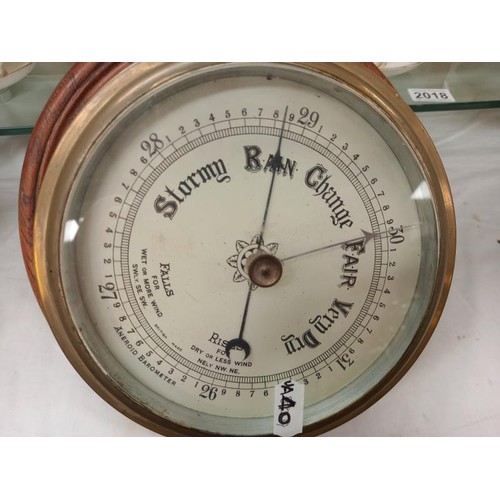 2011 - A cased ship's barometer.