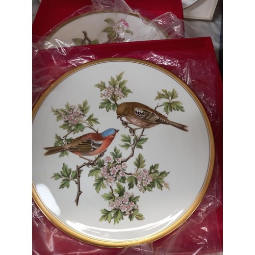 2055 - Two Spode bird plates and two Coalport Christmas plates.