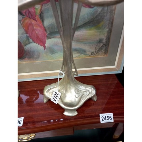 2065 - A pair of silver coloured art nouveau style candelabra.