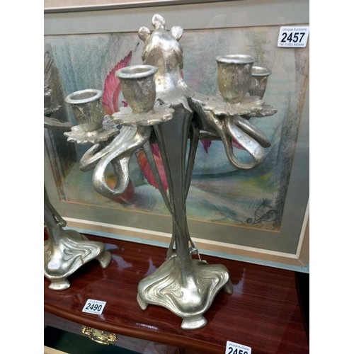 2065 - A pair of silver coloured art nouveau style candelabra.