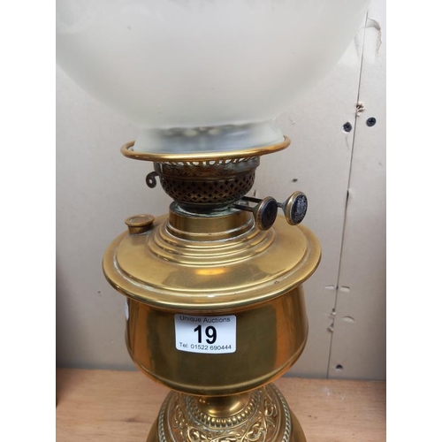 19 - A Victorian brass oil lamp with later etched glass shade. COLLECT ONLY.