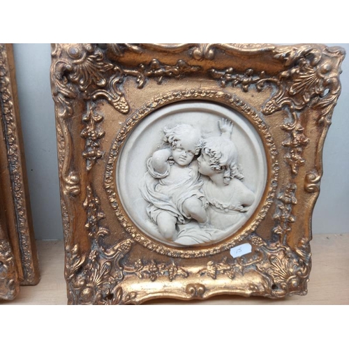 20 - 2 gilt framed classical resin plaques of children (28cm x 28cm)