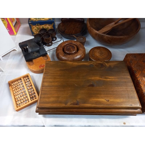 29 - A quantity of wooden items including salad bowl & Servers novelty cigarette box etc.