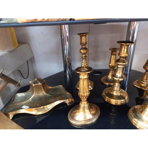 33 - A good selection of brassware including candlesticks, ink well & plane ornaments etc.