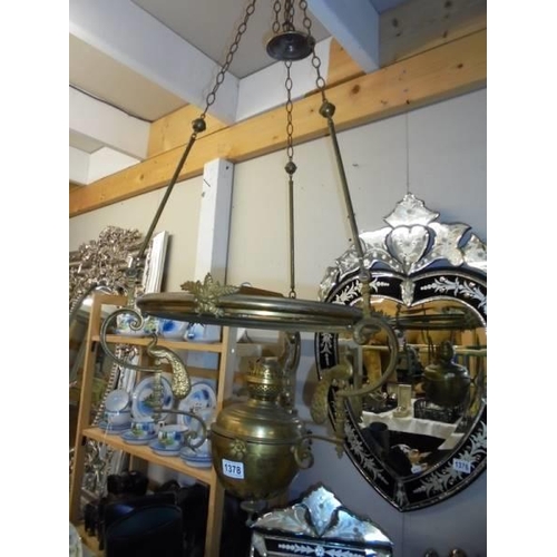 A brass hanging oil lamp (no shade or chimney), COLLECT ONLY.