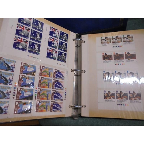 1600 - A box of Royal Mail mint definitive sets and two albums of mint stamps.