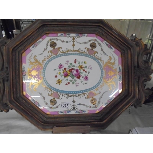 1616 - A gilt framed ceramic tray.