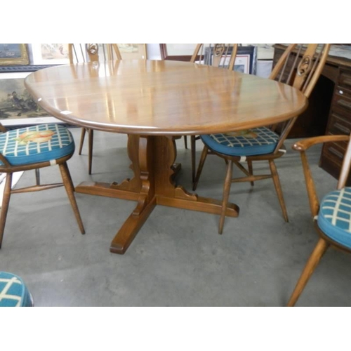 1708 - A good quality Ercol dining table with an extra leaf and six Ercol dining chairs, COLLECT ONLY.