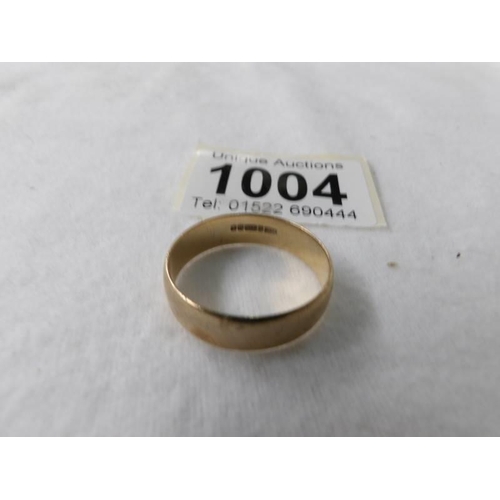 1004 - A 9ct gold wedding ring, size X, 4.9 grams.