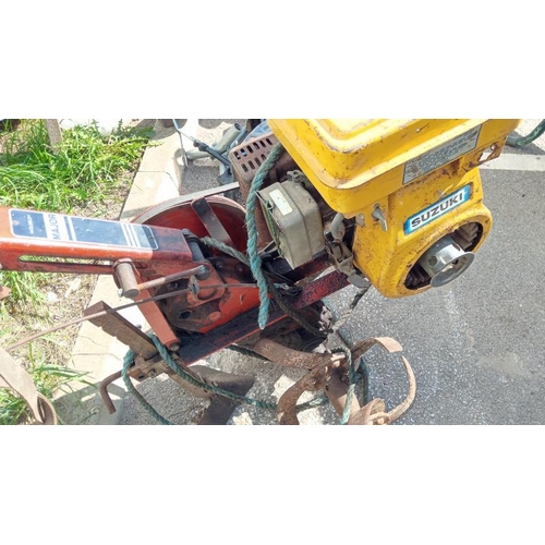 513 - A Suzuki powered rotavator (petrol). Collect Only