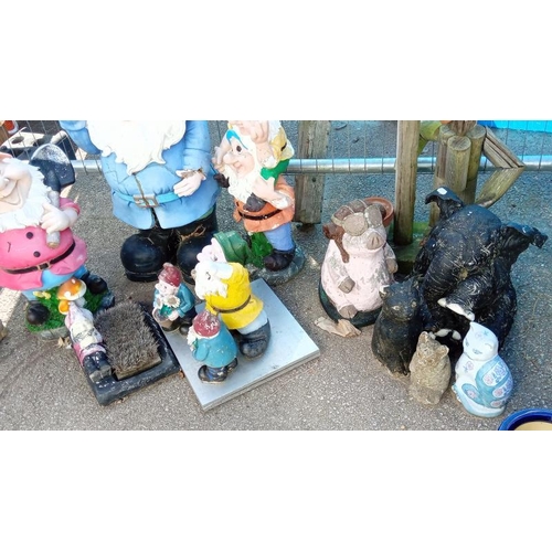 519 - A quantity of garden gnomes & pots etc. Collect Only