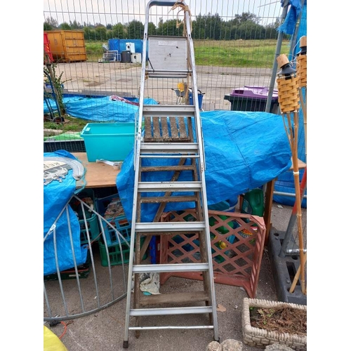 531 - An aluminium step ladder & a decorative wooden ladder. Collect Only