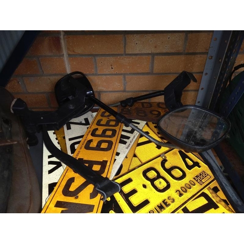 536 - 2 motorcycle seats, a quantity of  American & British number plates and a vintage helmet etc.
Collec... 