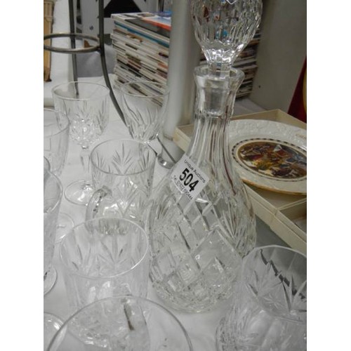 504 - A cut glass decanter and a quantity of glasses.
Collect Only.