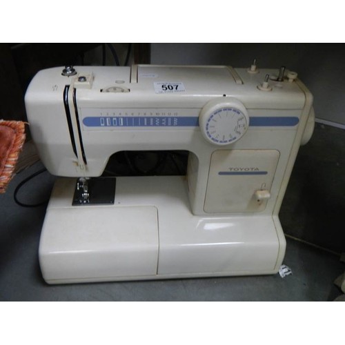 507 - An old sewing machine (no case or foot pedal)