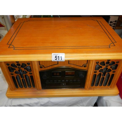 511 - A wood case record player. COLLECT ONLY.