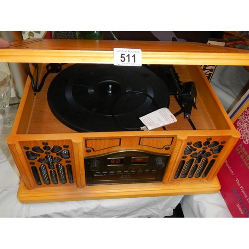 511 - A wood case record player. COLLECT ONLY.