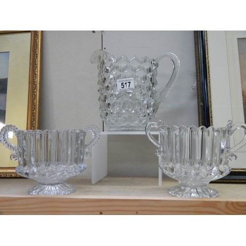 517 - A good quality cube glass vase and a pair of double handled vases. Collect Only.