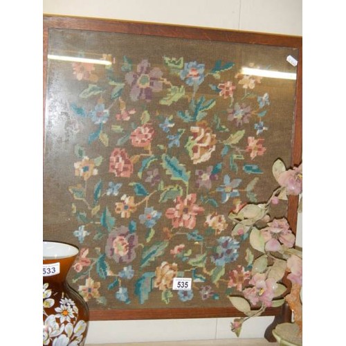 535 - An oak framed embroidered fire screen. COLLECT ONLY.