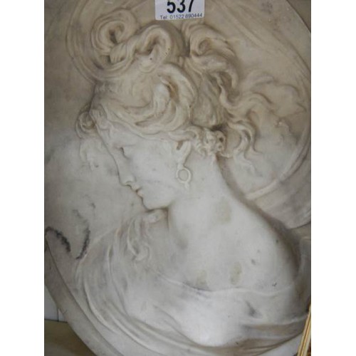 537 - An oval plaque of a lady, a/f.