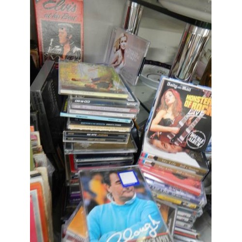 549 - A quantity of CD's and talking book tapes.