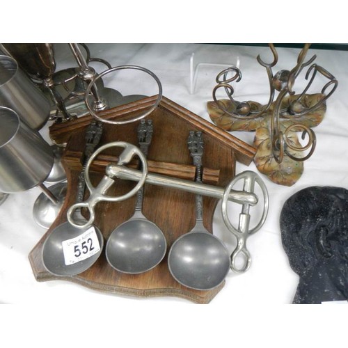 552 - A mixed lot of pewter and other items.